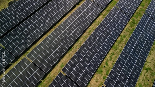 Sustainable energy pv modules solar farm left turning aerial