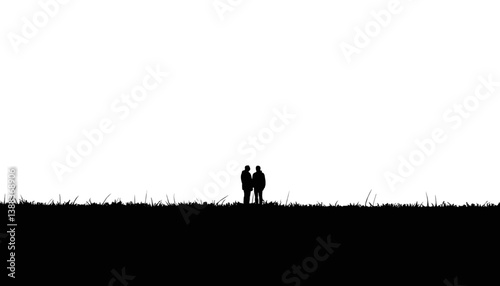 Couple silhouetted in a field, stargazing and dreaming together