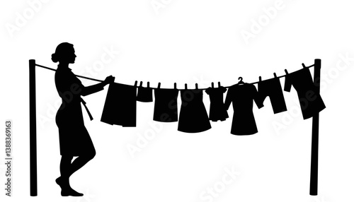 Silhouette of woman hanging laundry on clothesline, domestic routine