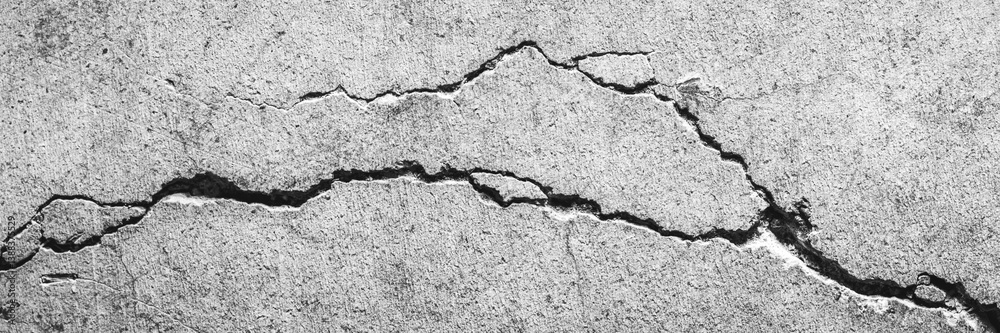 Fototapeta premium Old Cracked And Decaying Grey Concrete