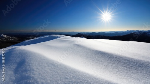 Pristine snowy mountaintop under a brilliant sun