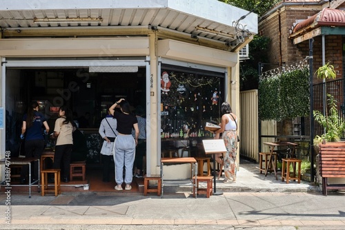 Marrickville, NSW - Dec 28, 2023: Customers queuing up to order food at VN Street Foods, a restaurant serving North Vietnamese street food such as pho tai lan, Hanoi bun cha and banh cuon in Sydney