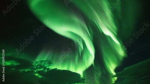 Majestic green aurora borealis dances across the starry night sky above clouds