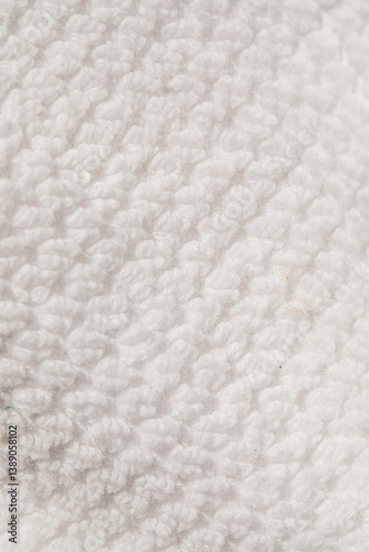 close up of a white terrycloth washcloth, towel