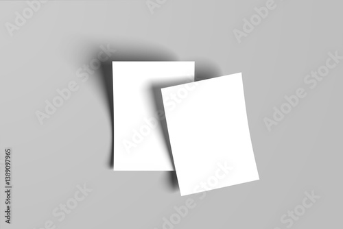 White blank sheets of a4/a5 paper size or documents mockup on a gray background. Template for design blank paper sheets	
