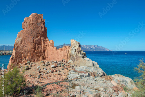 formation of red granite rocky peak on  clear sea in Sardinia Italy - Rocce R...