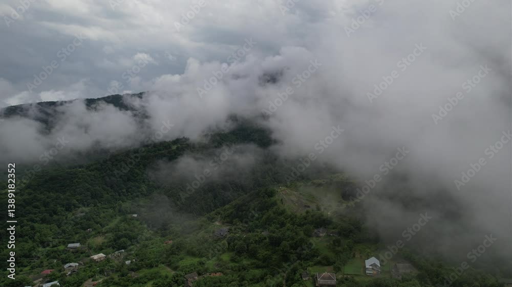 Ascending aerial view of the village of Gosh in the Tavush Province of Armenia on a cloudy day Ascending aerial view of the village of Gosh in the Tavush Province of Armenia on a cloudy day