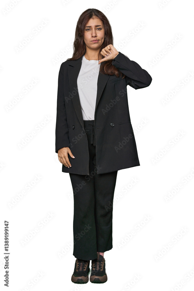 Middle Eastern in business attire showing thumb down, disappointment concept. Middle Eastern in business attire showing thumb down, disappointment concept.