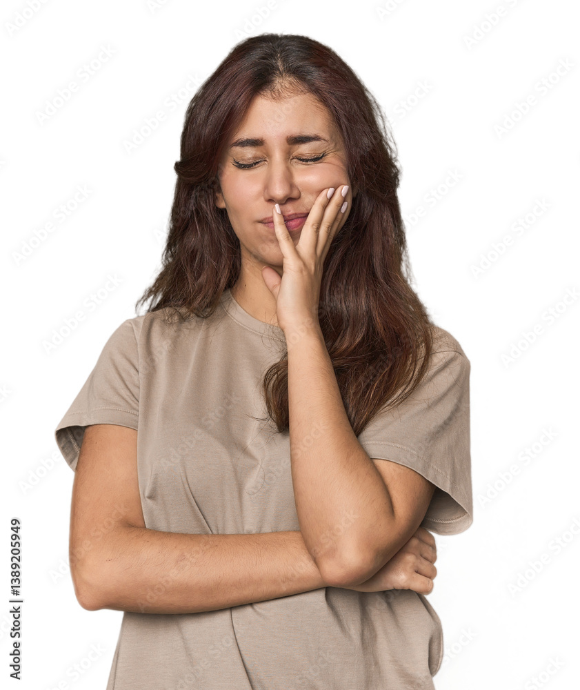 Middle Eastern woman in studio having a strong teeth pain, molar ache. Middle Eastern woman in studio having a strong teeth pain, molar ache.