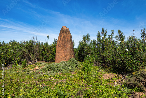 Sandstone Menir dating from 6000-4500 BC in the dry hills near Vale Fuzeiros, Algarve, Portugal.