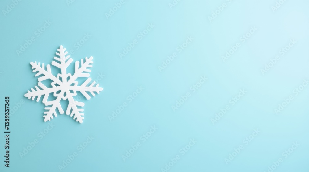 A minimalist composition featuring a single snowflake on a soft blue background A minimalist composition featuring a single snowflake on a soft blue background