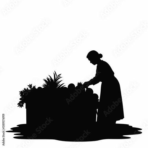 Elderly woman tending to fruit basket in silhouette  