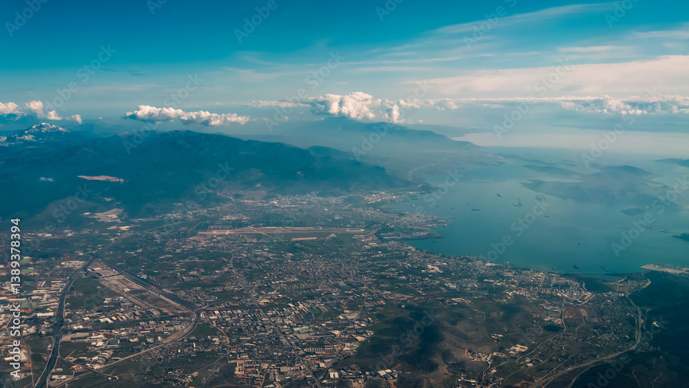 view from the plane window to Greece Athens and the Aegean Sea view from the plane window to Greece Athens and the Aegean Sea