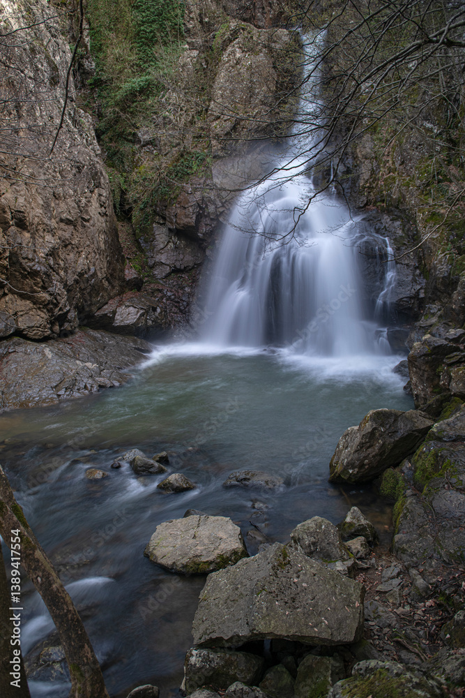 Obraz premium Erikli Waterfall photograph taken with long exposure. Waterfalls in Turkey. Waterfall view in the forest. Erikli Waterfall, Yalova.