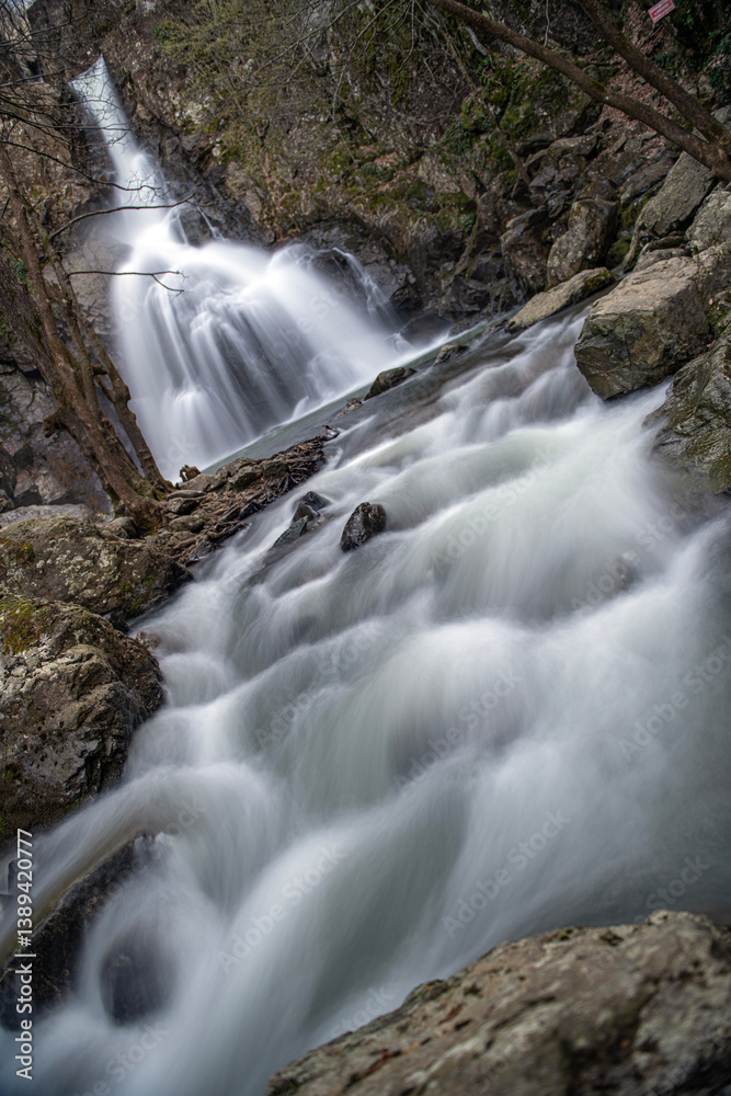 Fototapeta premium Erikli Waterfall photograph taken with long exposure. Waterfalls in Turkey. Waterfall view in the forest. Erikli Waterfall, Yalova.