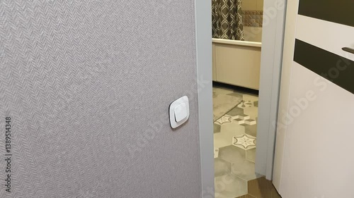 Man opens the door and exits from bathroom. Home