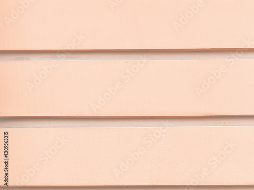 Obraz na płótnie Decorative elements on the wall. Rough painted surface. Empty place for text, images and ads. Vintage texture for background and design. Closeup. w salonie