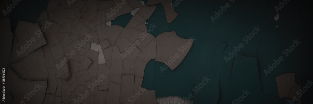 Dark wide panoramic background. Peeling paint on a concrete wall. Dark grunge texture of old cracked flaking paint. Weathered rough painted surface. Patterns of cracks. Darkness background for design.