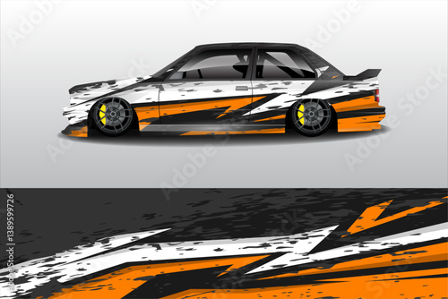 A sleek, modified car with a striking orange and black design parked on a smooth surface, showcasing its style