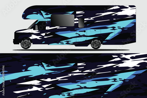 Abstractly designed RV with dynamic blue and black patterns, showcasing modern vehicle aesthetics