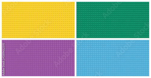 Colorful plastic building block baseplates in yellow green pink blue arranged in grid pattern toy texture background for construction design creativity development children fun playful vibrant concept