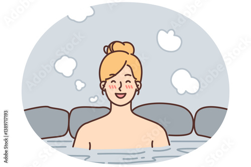 Cheerful woman relish spa treatments and hot beauty bath surrounded by natural stone