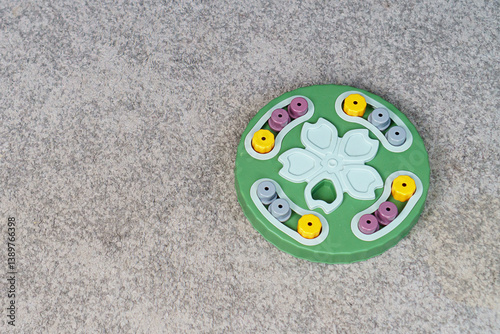 intellectual game for dogs on the background of the carpet at home. Training game for dogs. Close-up.