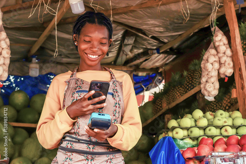 excited young sales person accepting digital payment of clients