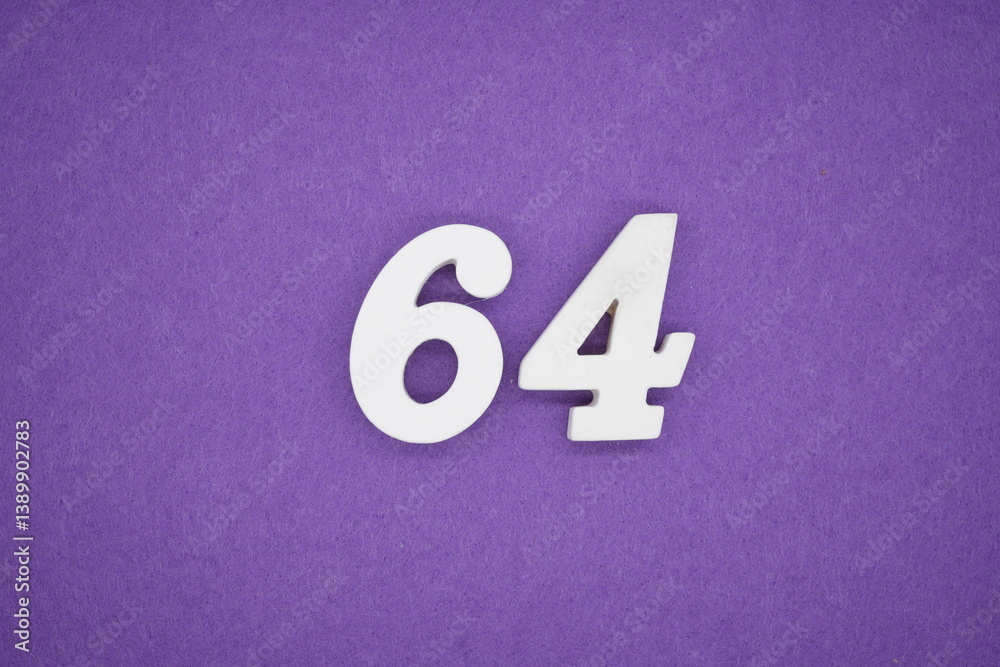 The numbers are made of white painted wood placed on a purple paper background. The numbers are made of white painted wood placed on a purple paper background.