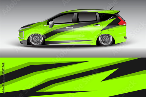 Vibrant green modified car with sleek design and striking black accents, showcased against a gradient backdrop