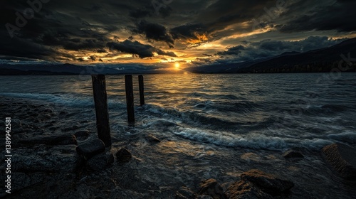 Dramatic Sunset over Lake and Mountains