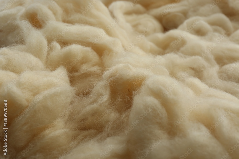 Soft white wool texture as background, closeup Soft white wool texture as background, closeup