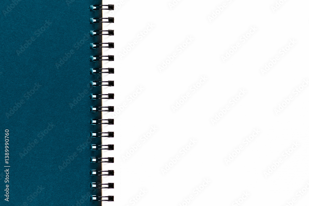 Open clean notebook with spiral on the side. Open clean notebook with spiral on the side.