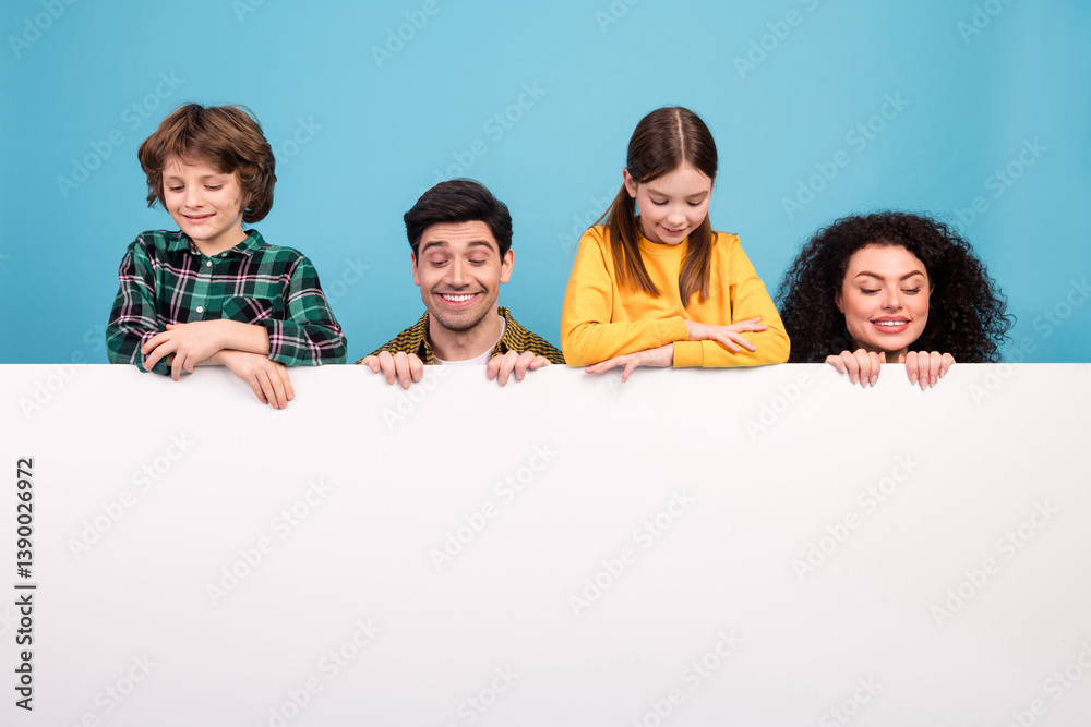 Happy family enjoying leisure time together against a vibrant blue background, showcasing bonding and happiness moments Happy family enjoying leisure time together against a vibrant blue background, showcasing bonding and happiness moments