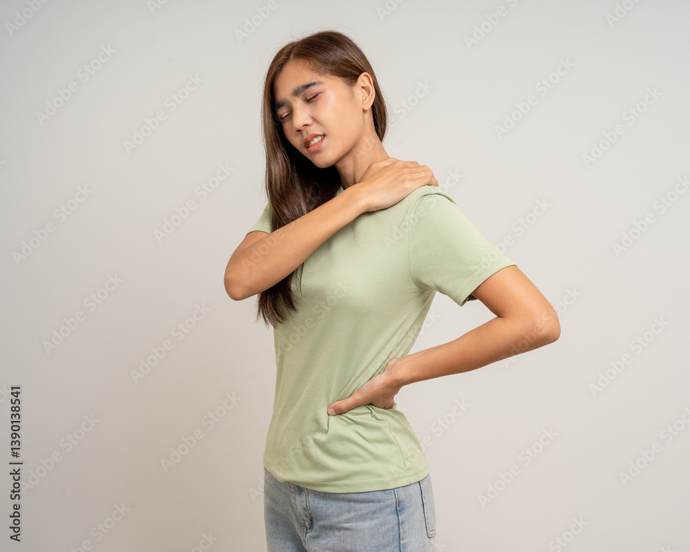 Asian woman has problem with structural posture She had neck and shoulder pain. She massaged her neck and shoulders for relief. reduce muscle tension. Unwell unhealthy on isolated white background Asian woman has problem with structural posture She had neck and shoulder pain. She massaged her neck and shoulders for relief. reduce muscle tension. Unwell unhealthy on isolated white background