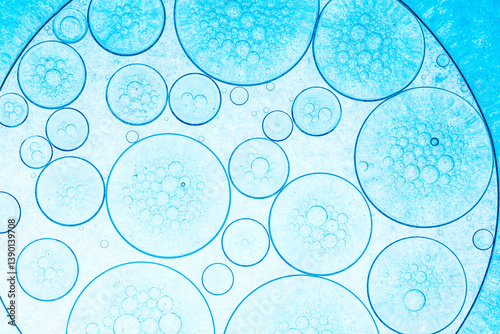 Macro blue science experiment bubble texture,A close-up of a blue liquid with bubbles in a petri dish, showcasing a captivating microscopic view. ideal for concepts of science, medicine, research, 