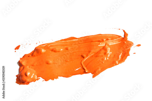 A shapeless spot of orange-hued watercolor paint is applied to a white background.