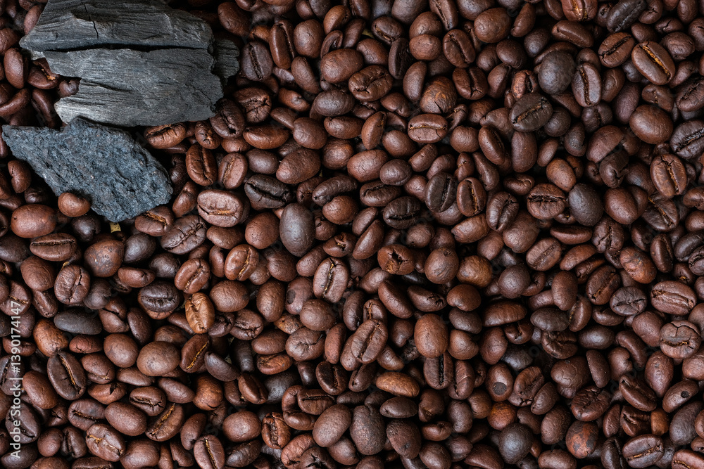 Coffee beans and charcoal, natural production concept Coffee beans and charcoal, natural production concept
