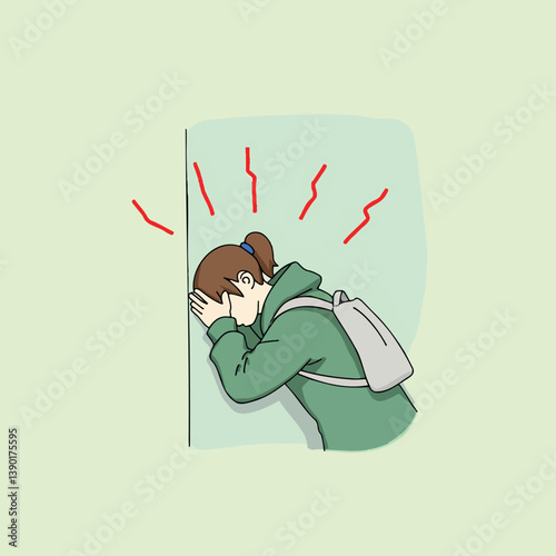 young person wearing a green jacket leans against a wall appearing stressed and overwhelmed.