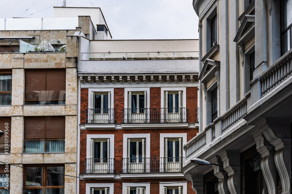 A close-up view of Madrid architectural elegance along the bustling Gran Via street. A close-up view of Madrid architectural elegance along the bustling Gran Via street.