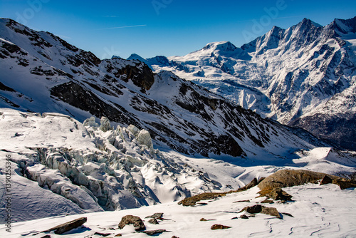 Breathtaking panorama of the 4000 metre mountains of the canton of Valais photographed on the snowshoe tour through the Trift Glacier. The photo shows the Allalinhorn, Alphubel, the Täschhorn, the Dom photo