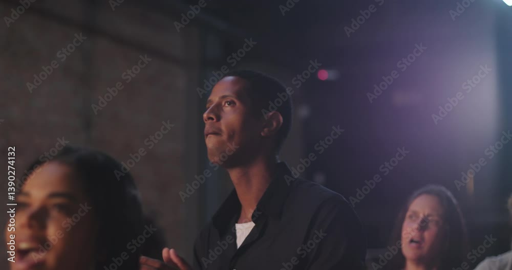 Man clapping in evangelical church worship, Afro-descendant male with joyful expression, black shirt, community celebration of faith, spiritual devotion and praise