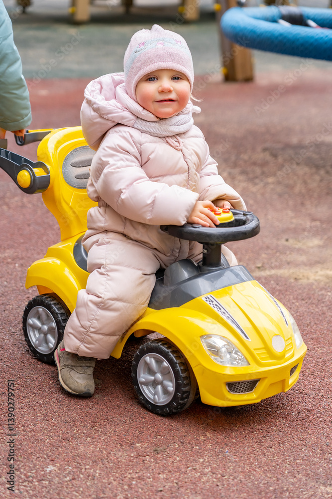 custom made wallpaper toronto digitalJoyful play: Little child on a toy vehicle at playground