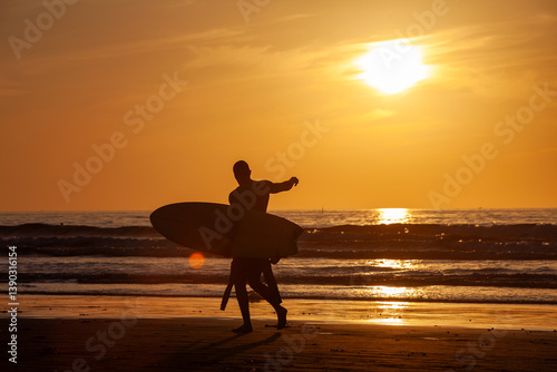 Surfer at Sunset: Connection with the Ocean