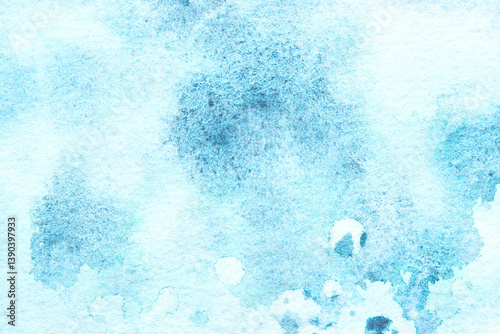 Abstract blue watercolor texture with cloudy brush strokes for artistic backgrounds and design projects.