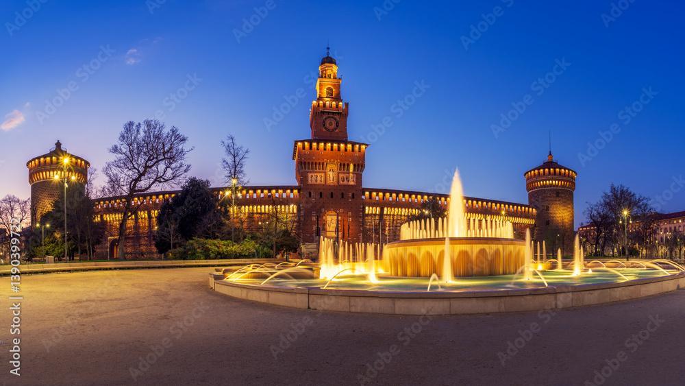 Sforza castle ( Castello Sforzesco ) at night, amazing old middle age Italian castle with fountain illuminated, Milan , Italy.