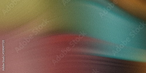 Abstract blurred background with a blend of green red yellow and turquoise colors in motion effect