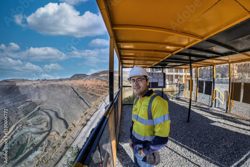 engineer miner worker, at the diamond open pit mine, overlooking the extraction process at the plant in the diamond industry