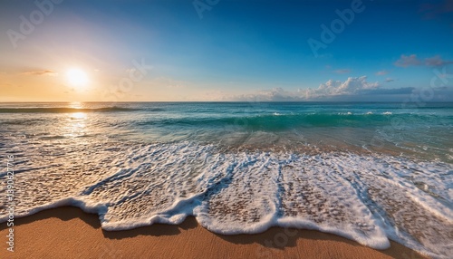 gentle waves lap at a beautiful sandy beach