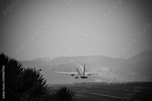PLANE TAKING OFF AND LANDING FROM THE PLANE, ROLLING ON THE RUNWAY